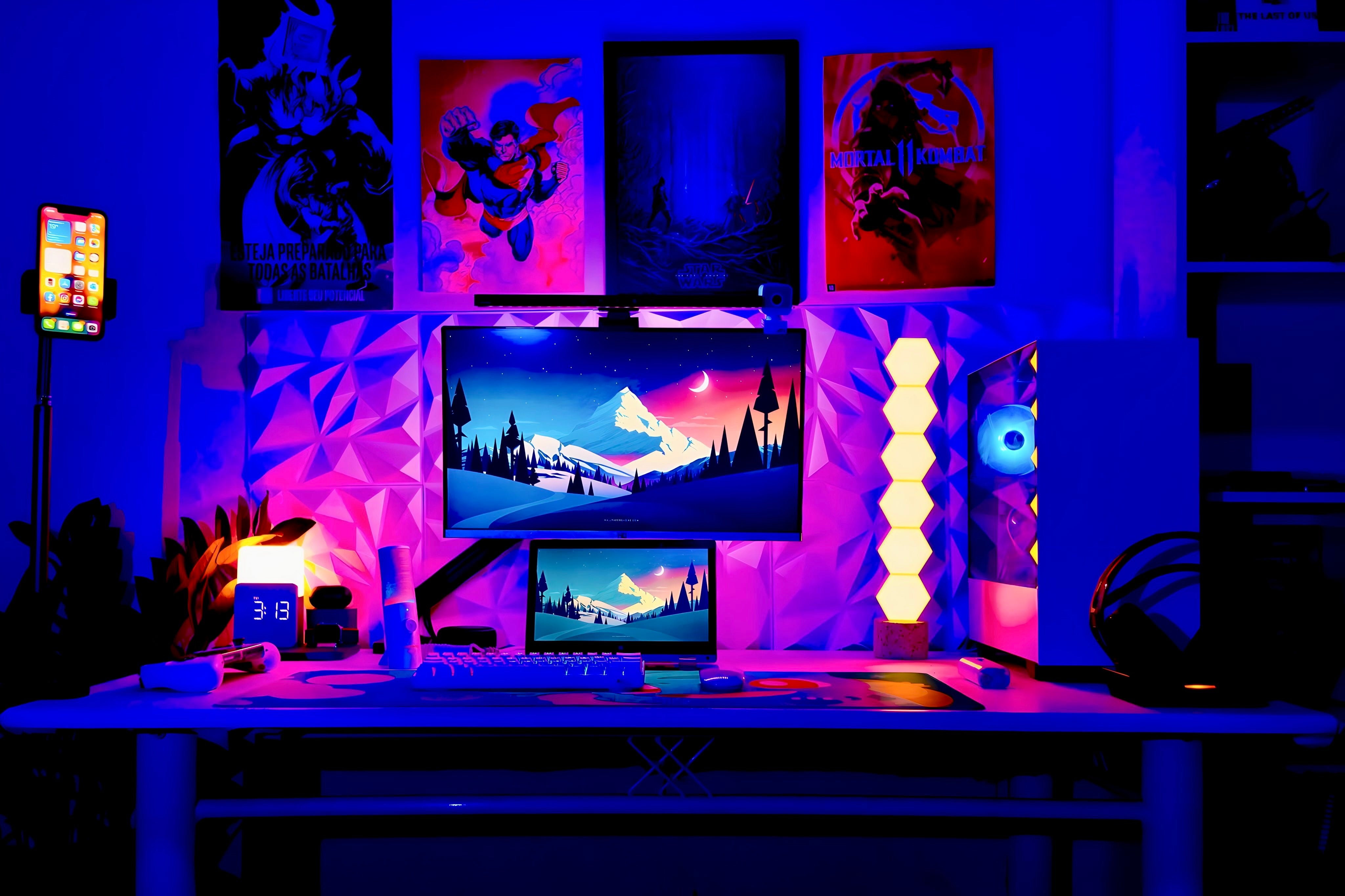 rgb lit gaming setup with, monitor, pc, white mechanical keyboard, headsets