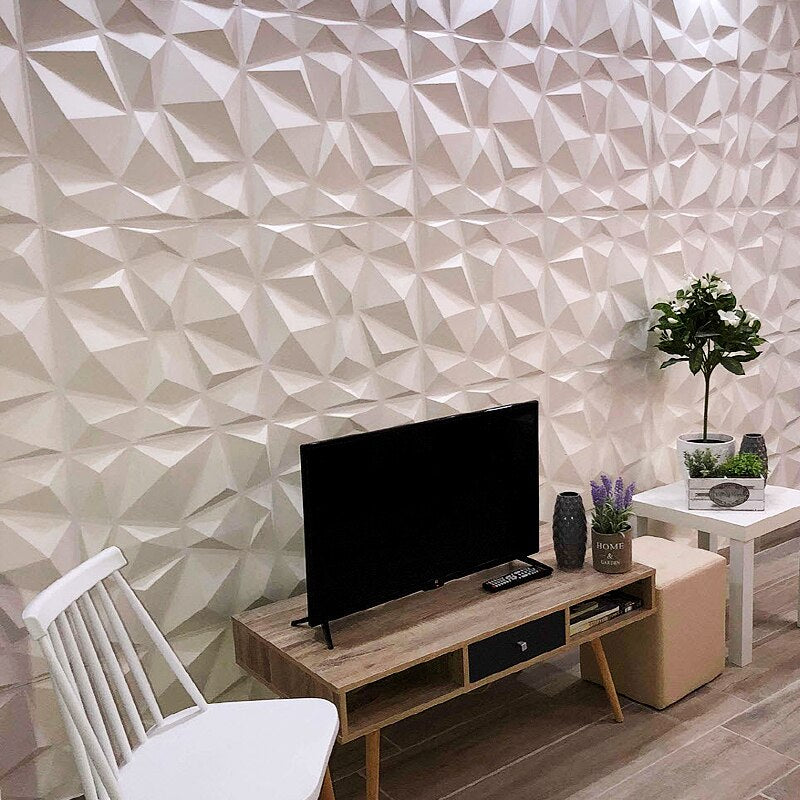 white 3d wall panels on wall next TV and white chair