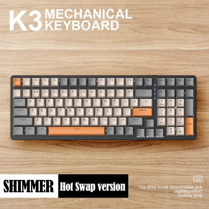 beige, grey and orange hot swap mechanical keyboard on wood background