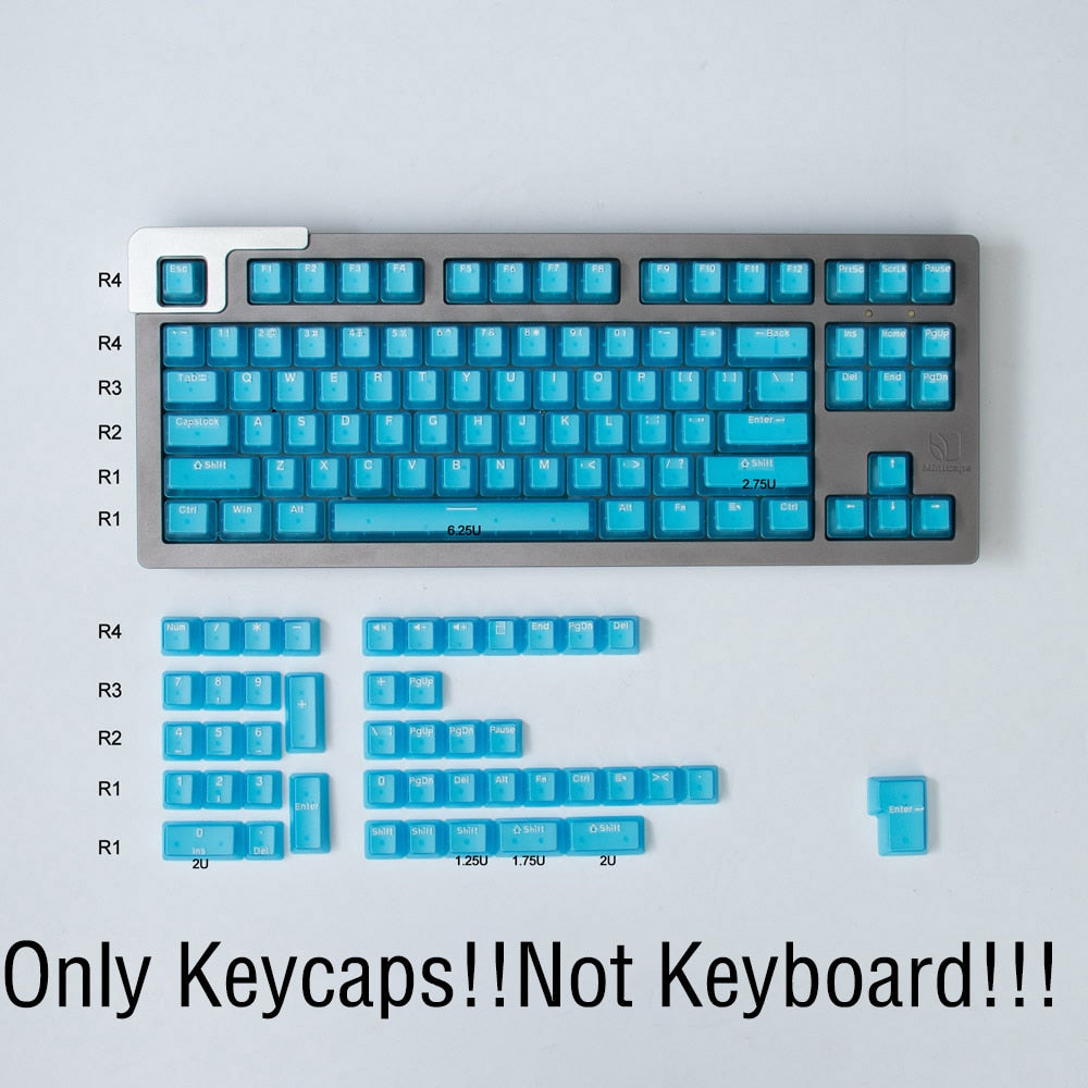 blue transparent keycap set on a silver mechanical keyboard