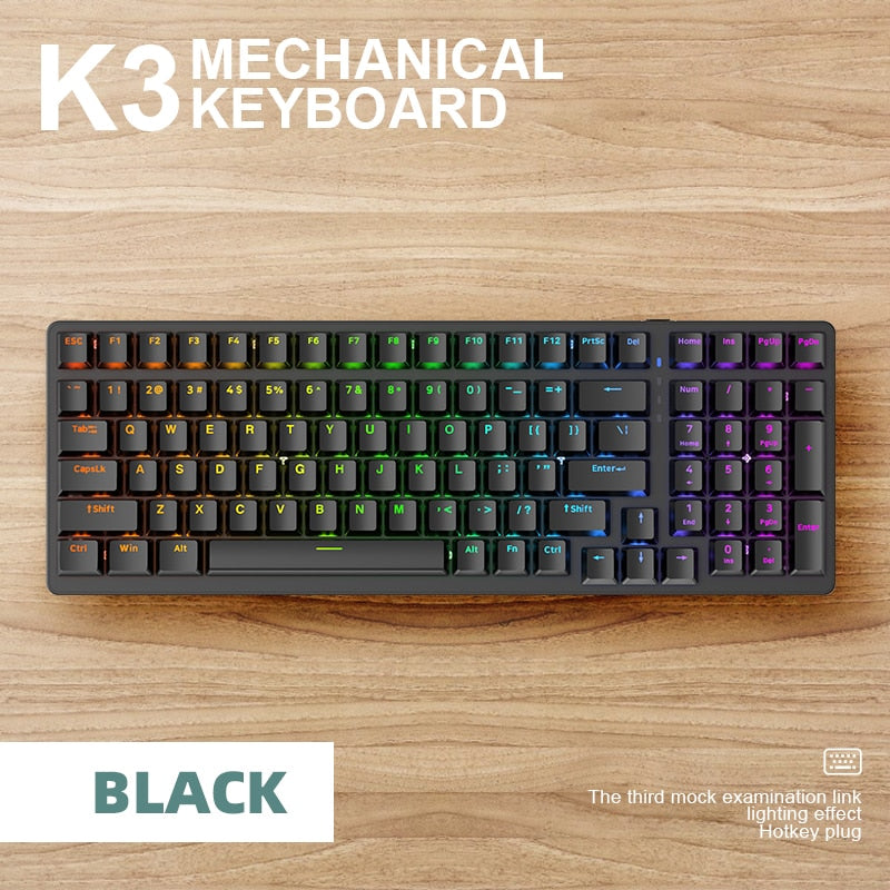 black mechanical keyboard on wood blackground