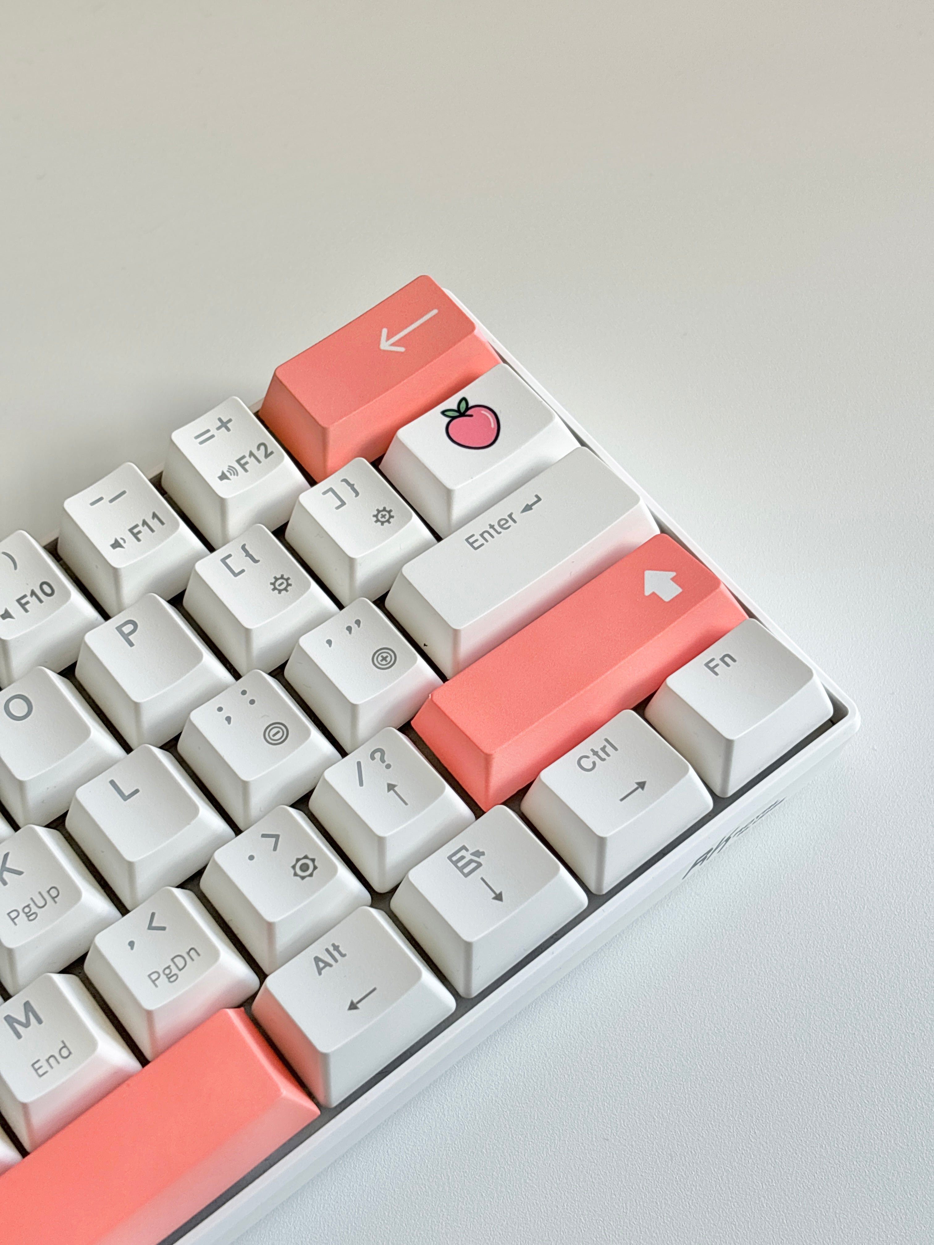 close up of peach accent keycaps